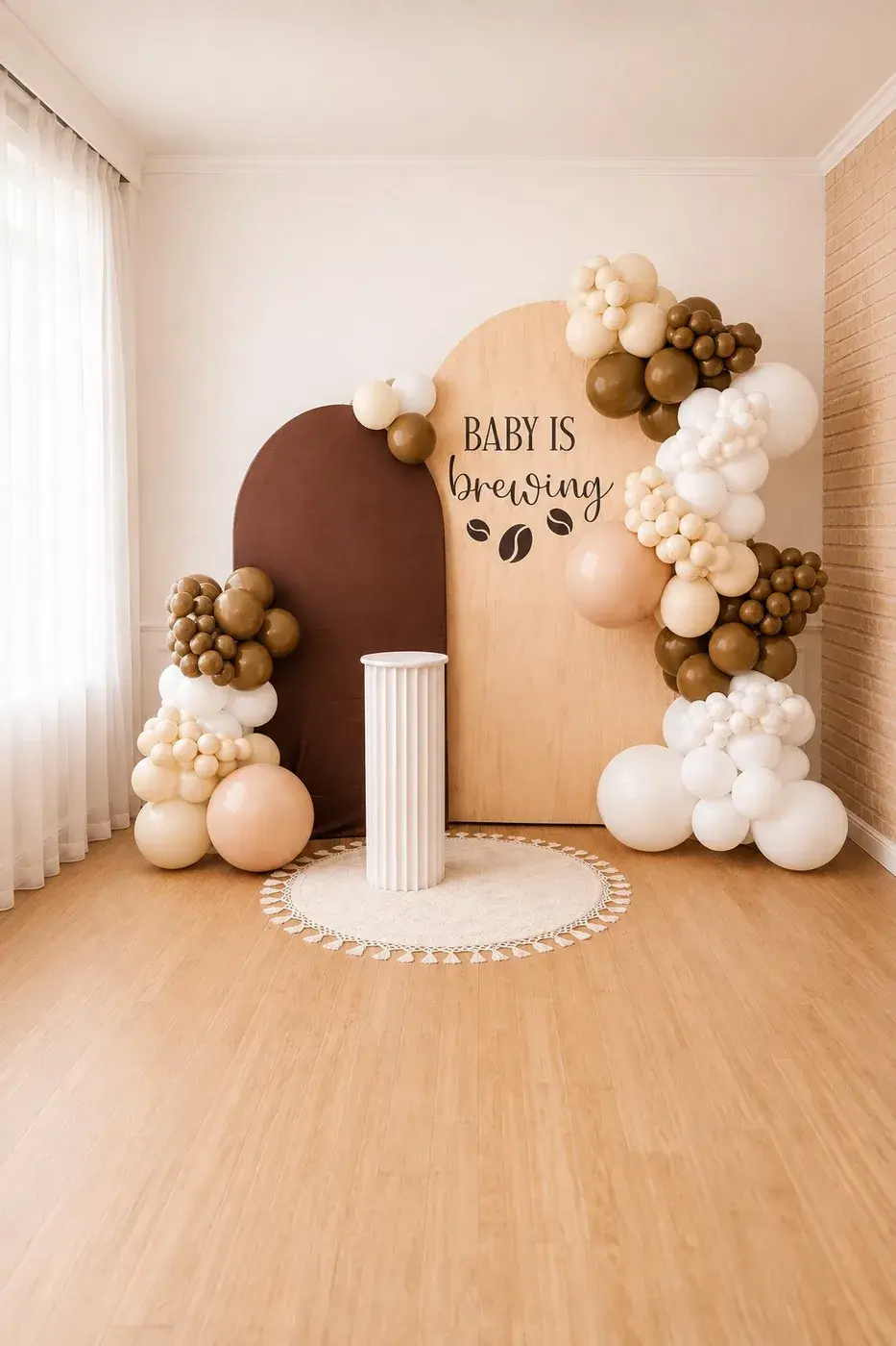 Neutral toned baby shower arches